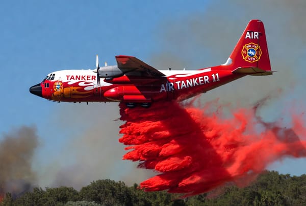 A C-130 labeled Air Tanker 11.